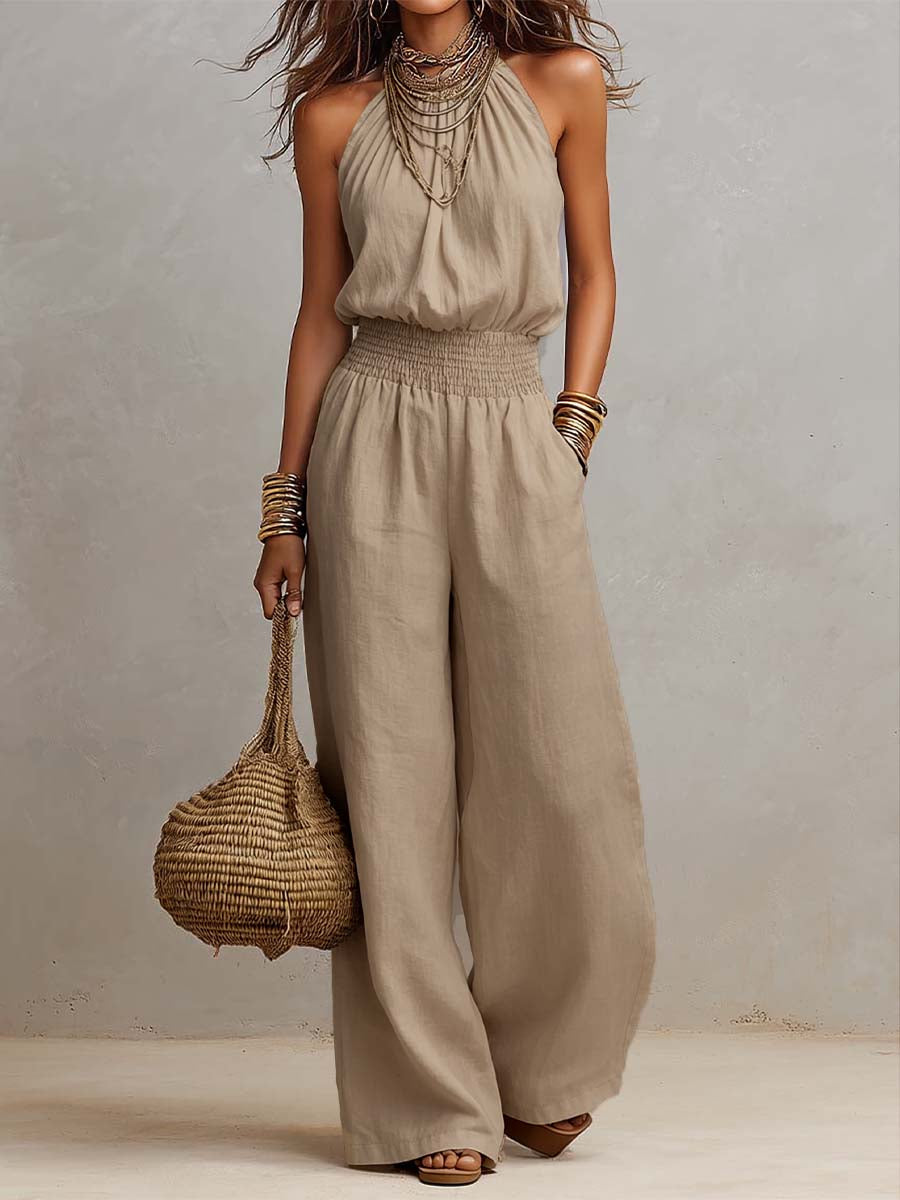 Mono mujer de espalda descubierta con escote halter y pierna ancha